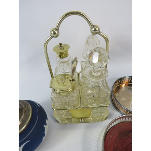 166 - Glass cruet set in lemon gilt stand, 3 wine bottle coasters and a Adams jasperware sugar bowl.