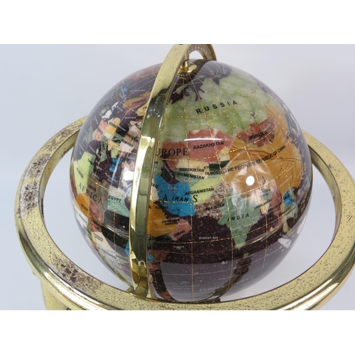 191 - Semi precious stone world globe in a gold could coloured stand (pitting to the gold) 13.5