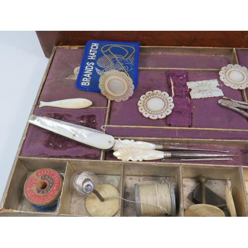 196 - Antique wooden sewing box and contents, including various Mother of pearl items. 12