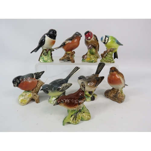 214 - Nine Beswick figurines, some have boxes.