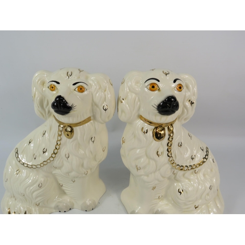 219 - Pair of Royal Doulton Staffordshire spaniels, 10