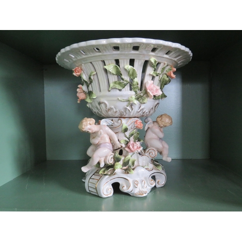 251 - Large Dresden style porcelain centre piece bowl decorated with cherubs and flowers, 11 1/4