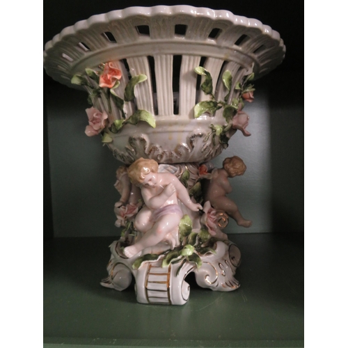 251 - Large Dresden style porcelain centre piece bowl decorated with cherubs and flowers, 11 1/4