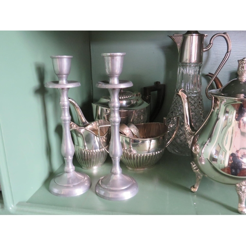 253 - Large selection of silver plated items including teasets, claret jug etc.