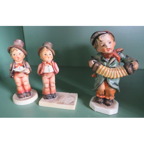 265 - Two Goebel Hummel and one Friedel figurines.