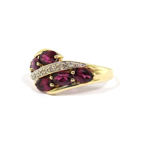 301 - 9ct Yellow Gold Ring set with six Rhodalites with a band of Diamond Chips. Finger size 'Q'  2.4g