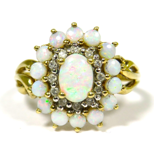 304 - 9ct Yellow Gold Ring Set with a Central Opal with Diamond and Opal Surround.  Fingers size 'O-5'   3... 