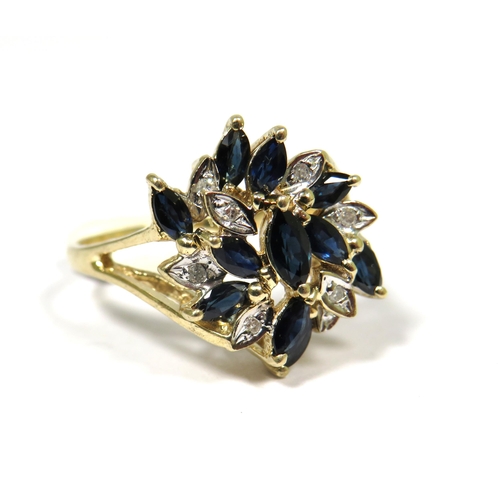 307 - 9ct Yellow Gold Ring set with Clusters of Diamond and Sapphires.  Finger size 'M'   3.3g