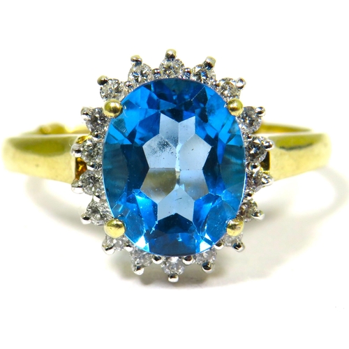 310 - 9ct Yellow Gold Ring set with a large Central Topaz (10x 8mm) Diamond Surround. Finger Size 'R'  3.5... 