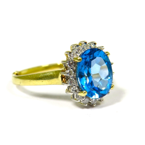 310 - 9ct Yellow Gold Ring set with a large Central Topaz (10x 8mm) Diamond Surround. Finger Size 'R'  3.5... 