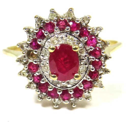 315 - 9ct Yellow Gold Ring set with a Central Ruby (6 x 4mm) With alternate surrounds of Diamonds and Rubi... 