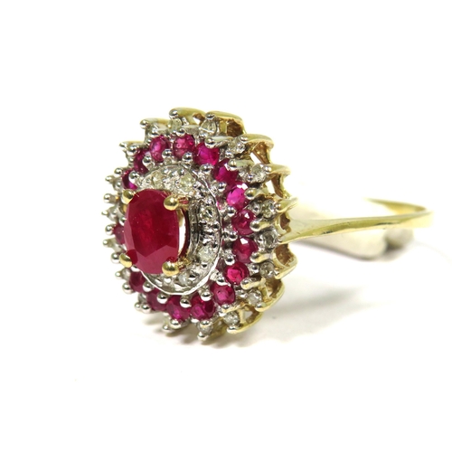 315 - 9ct Yellow Gold Ring set with a Central Ruby (6 x 4mm) With alternate surrounds of Diamonds and Rubi... 