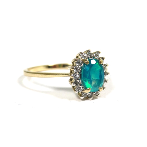 329 - 9ct Yellow Gold Ring set with Rhodolite Lab created Blue/Green Opal.  Finger size 'N'  1.9g