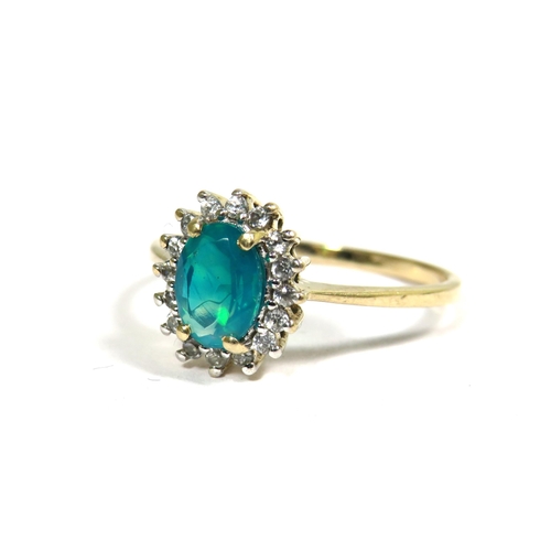 329 - 9ct Yellow Gold Ring set with Rhodolite Lab created Blue/Green Opal.  Finger size 'N'  1.9g