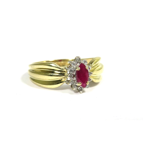 331 - 9ct Yellow Gold Ring set with a Central Oval Ruby (6 x 3mm) with Diamond Surround.  Finger size 'M' ... 