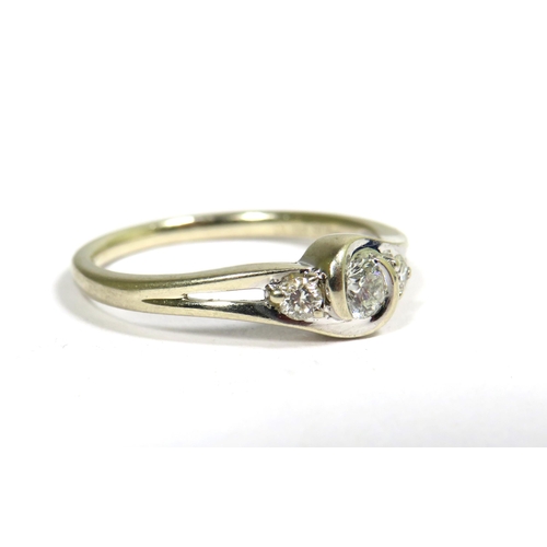 334 - 9ct White Gold Ring set with a Central Diamond of 0.16pt with Two 0.10pt Diamonds to Sides.  Finger ... 