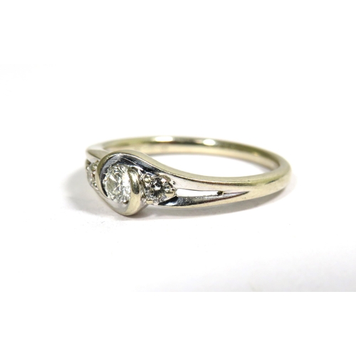 334 - 9ct White Gold Ring set with a Central Diamond of 0.16pt with Two 0.10pt Diamonds to Sides.  Finger ... 