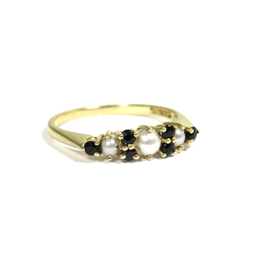 336 - 9ct Yellow Gold Ring set with Six small Sapphires and Three Seed Pearls.   Finger size 'N'   1.6g