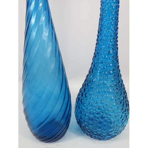 285 - Two Blue Italian glass Empoli style genie bottles, 1 stopper has had a repair.