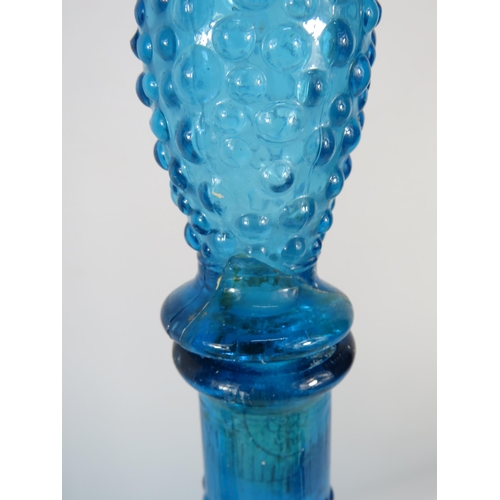 285 - Two Blue Italian glass Empoli style genie bottles, 1 stopper has had a repair.