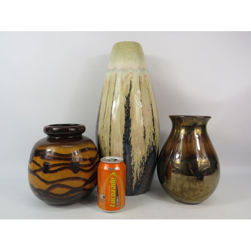 287 - Four ceramic vases West german pottery, Poole pottery, Japanese Satsuma etc (Satsuma vase has been r... 