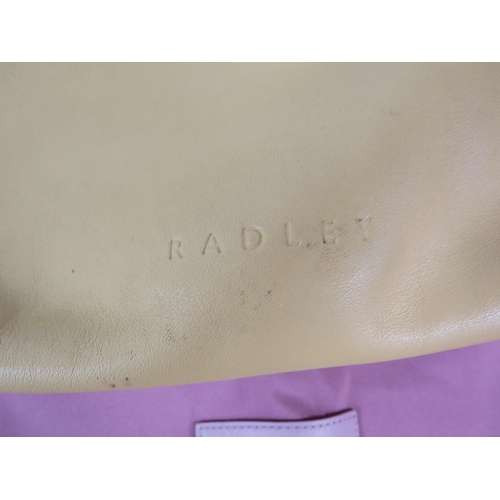 288 - Ladies Radley handbag in used condition with storage bag.