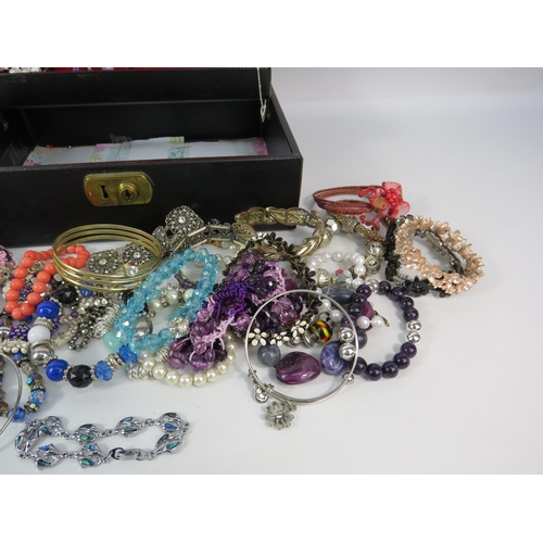 293 - Jewellery box with costume jewellery bracelets and necklaces.