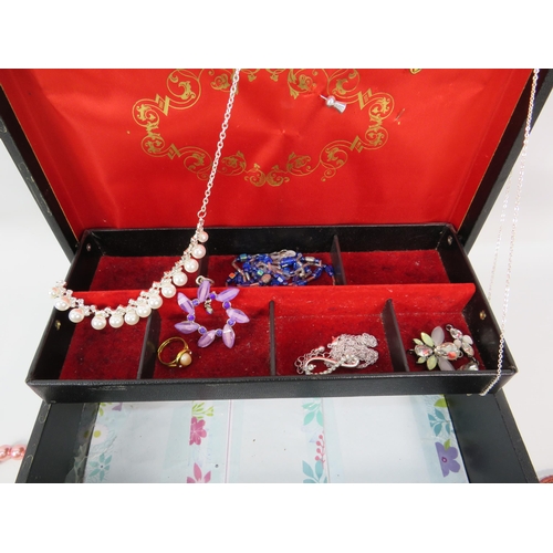 293 - Jewellery box with costume jewellery bracelets and necklaces.