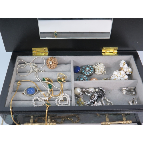 294 - Jewellery box and costume jewellery contents including a rolled gold enamel faced locket.