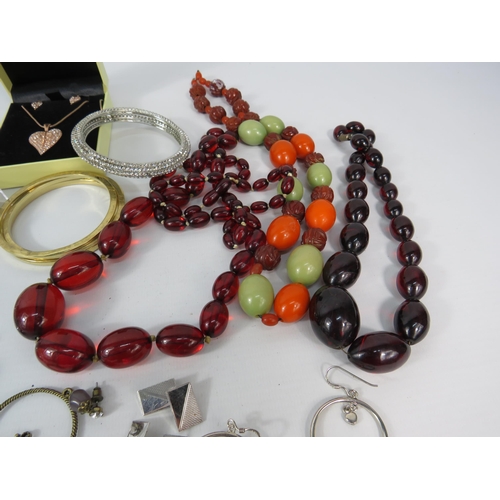 299 - Mixed costume jewellery including a bakelite bangle, cherry bead necklaces and some sterling silver ... 