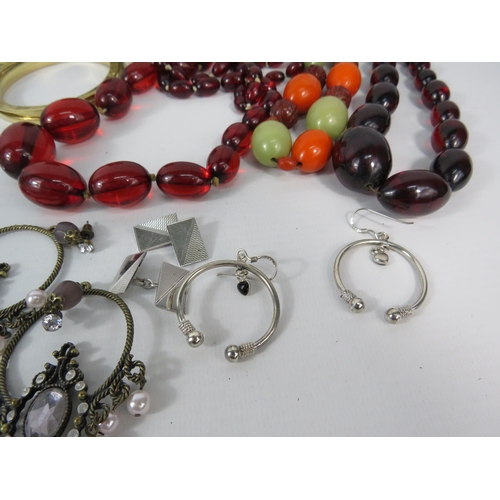 299 - Mixed costume jewellery including a bakelite bangle, cherry bead necklaces and some sterling silver ... 