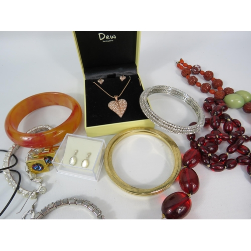 299 - Mixed costume jewellery including a bakelite bangle, cherry bead necklaces and some sterling silver ... 