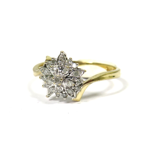 345 - 9ct Yellow Gold Ring set with Diamonds in a Flower pattern. 0.15pts of Diamonds. Finger size  P    2... 