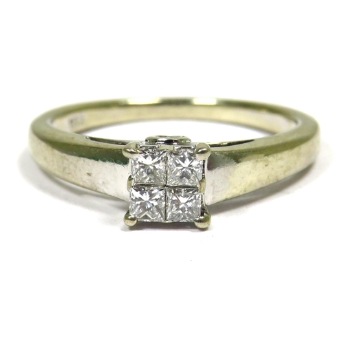 352 - 18ct White Gold Ring set with Four Square Cut Diamonds. Finger size 'I-5'  2.5g