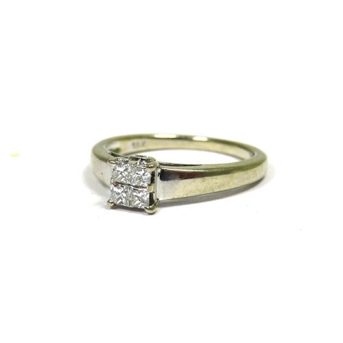 352 - 18ct White Gold Ring set with Four Square Cut Diamonds. Finger size 'I-5'  2.5g