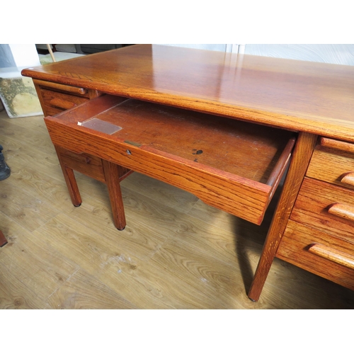 1000 - Solid Oak Pedestal Desk with Central Top Drawer and drawers to each size mad by Abbess.  H:30 x W:60... 