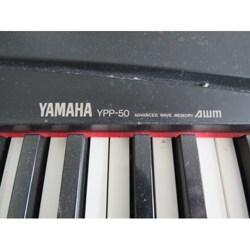 1004 - Yamaha electric Keyboard. YPP 5050 Advanced Wave Memory with stand in working order.