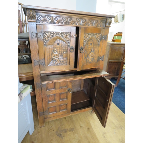 1010 - Cocktail Cabinet in the Old Charm Style.  Made from Oak with carved Decoration.  H:49 x W:43 x D:19 ... 