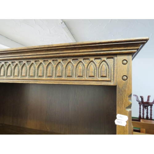 1023 - Large Oak Five Shelf Bookcase with carved Freize to top. H:72  inches. See photos