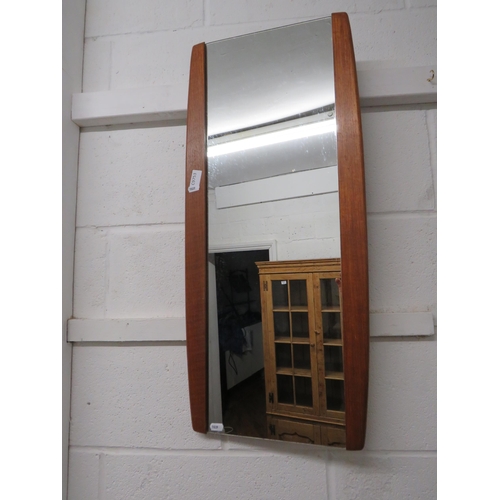 1039 - Mid 20th Century Teak framed mirror. Can be hung in landscape or Portrait.  Measures 31 x 14 inches.... 