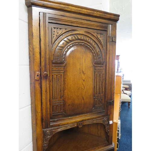 1041 - Oak Corner Cabinet in the old charm style. Comes in two pieces.  H:70 inches tall. See photos.