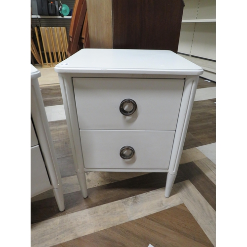 1055 - Two Small White bedside tables. See photos.