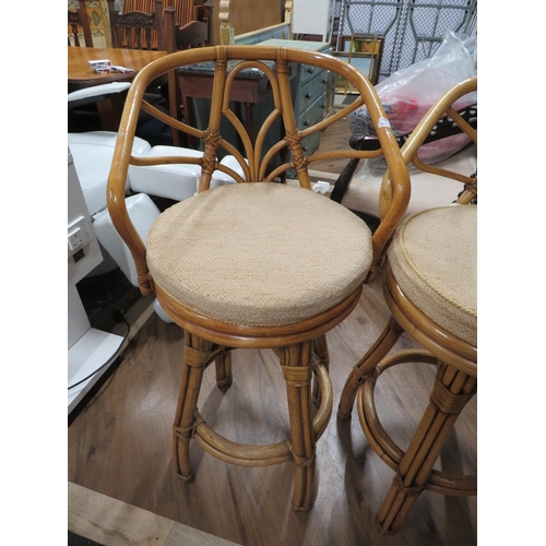 1068 - Pair of Bentwood Bar stools with cushioned seats. See photos.