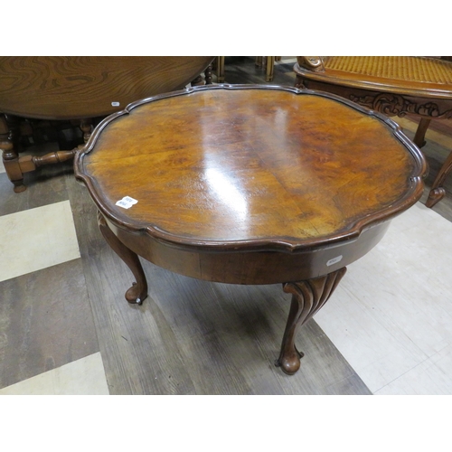 1071 - Nicely Carved Vintage Bergere tub chair together with a small vintage circular table. See photos.