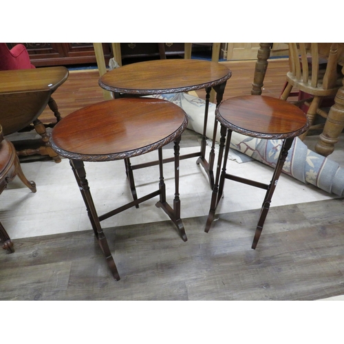 1072 - Trio of Darkwood nest of tables. See photos.