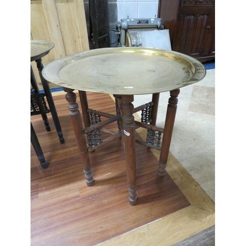 1087 - Pair of Vintage Eastern  Brass topped tables with folding frames. See photos.