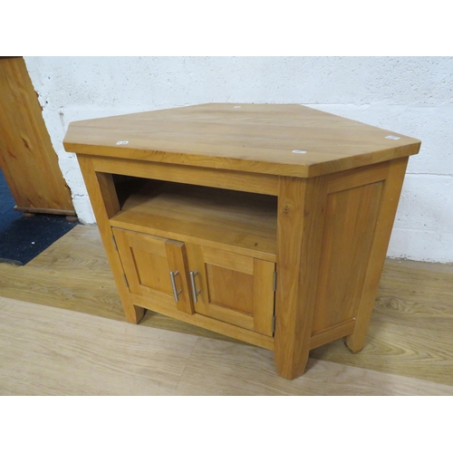 1093 - modern Lightwood corner cabinet. H:25 x W:37 x D:20 inches. See photos.