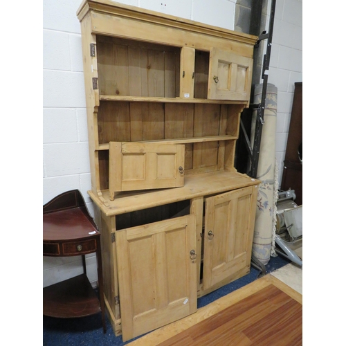 1097 - Anique Stripped pine dresser in need of light repairs.  H:79 x W:51 x D:19 inches. See photos.