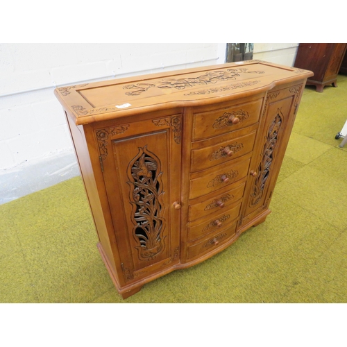 1115 - Ornate Cabinet with pierced doors, six drawers to centre console.. H:34 x W:37 x D:14 inches. See ph... 