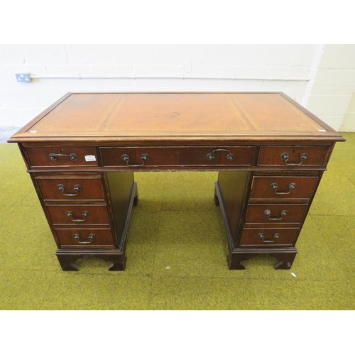 1116 - Leather topped Kneehole pedestal desk in good order. H:30 x W:48 x D:24 inches. See photos.